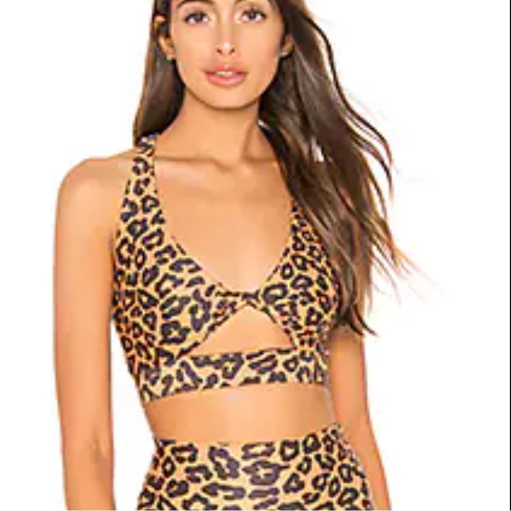 BEACH RIOT Twist Sports Bra in Leopard
